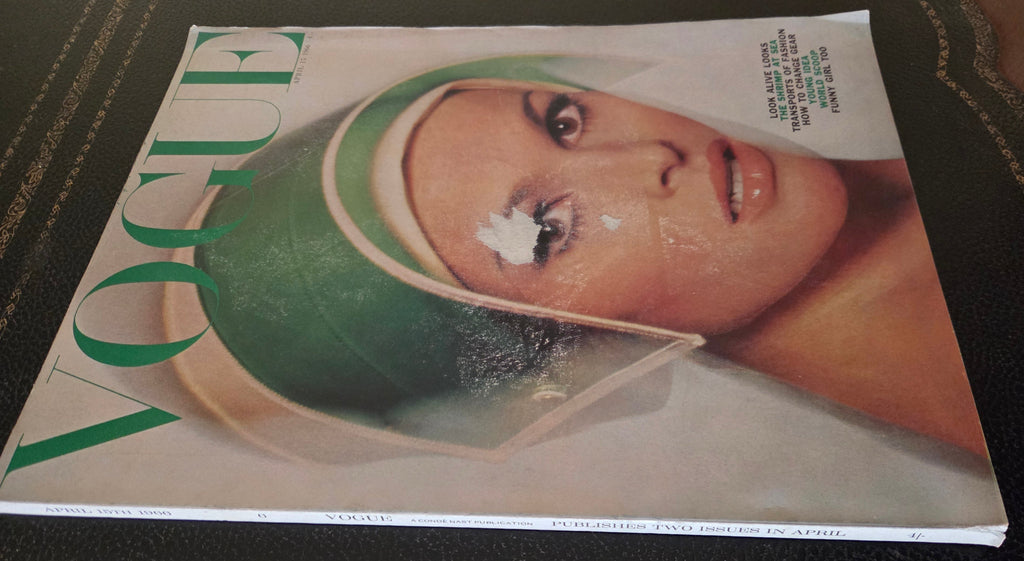Vintage vogue with slight front cover damage.