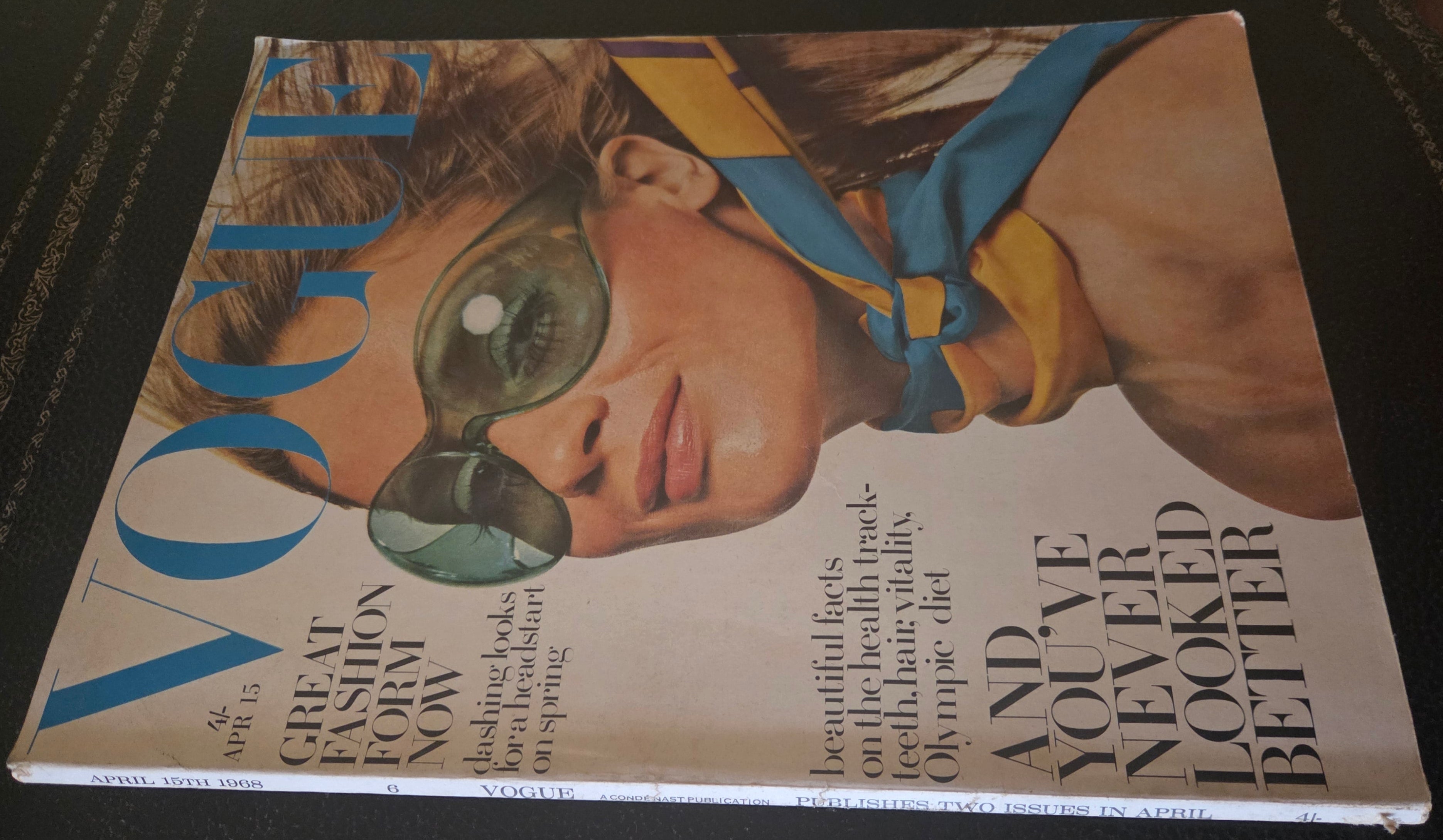 Vogue with model in glasses and scarf