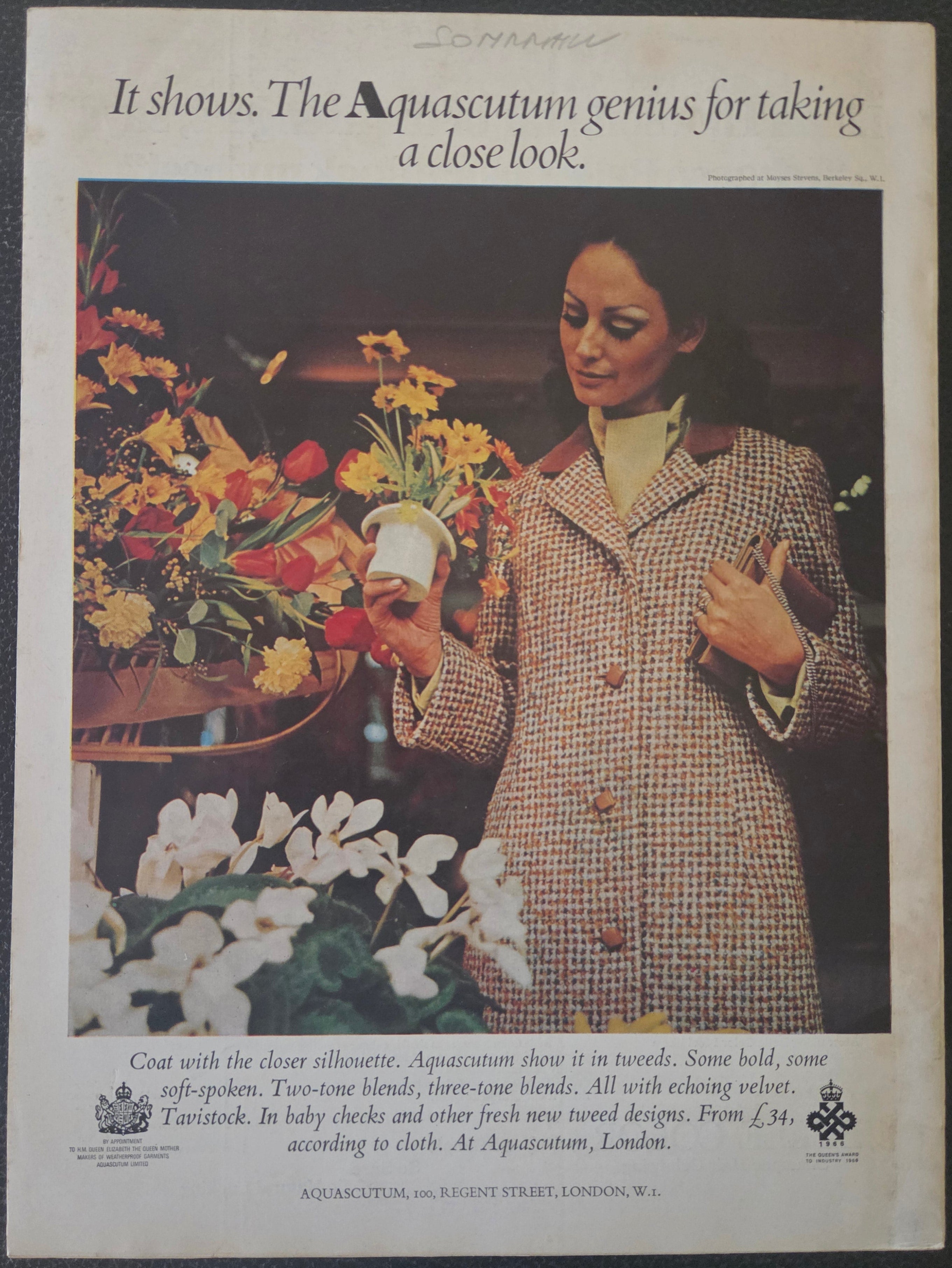 Vintage advertisement featuring a person arranging flowers.