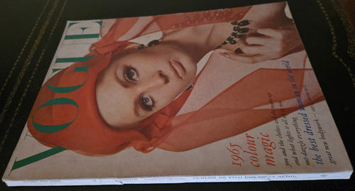 Vintage magazine cover with a woman's face and text