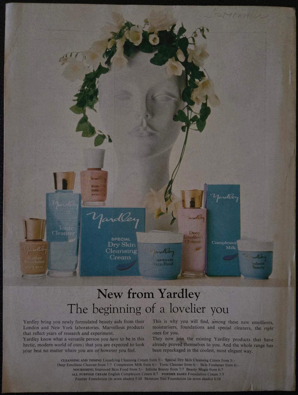 Advertisement for Yardley products featuring a statue and flowers on a white background