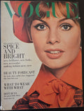 Vintage Vogue magazine cover with a woman's face and text