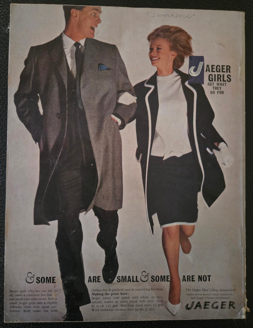 Vintage Jaeger advertisement with two people wearing suits on a plain background