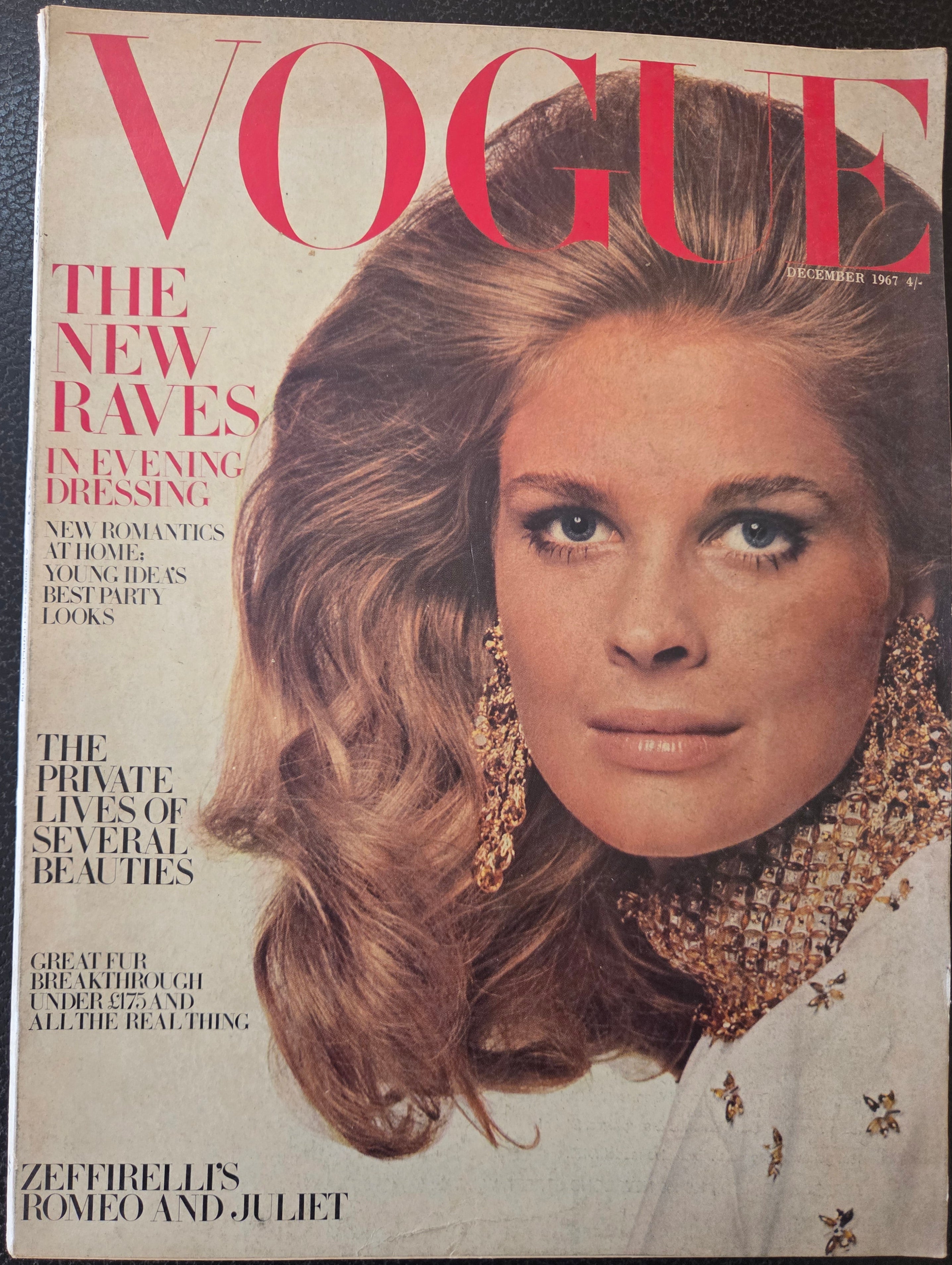 Vogue with brunette model wearing gold