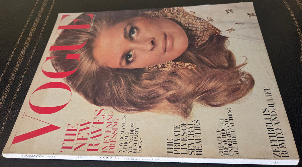 Vogue magazine with brunette model.