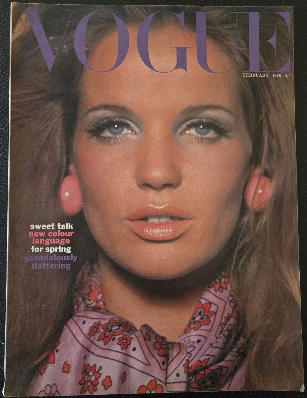 Vogue magazine cover with a close-up of a woman's face