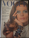 Vintage Vogue magazine cover with a model wearing jewelry