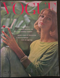 Vintage Vogue magazine cover with a woman holding a drink