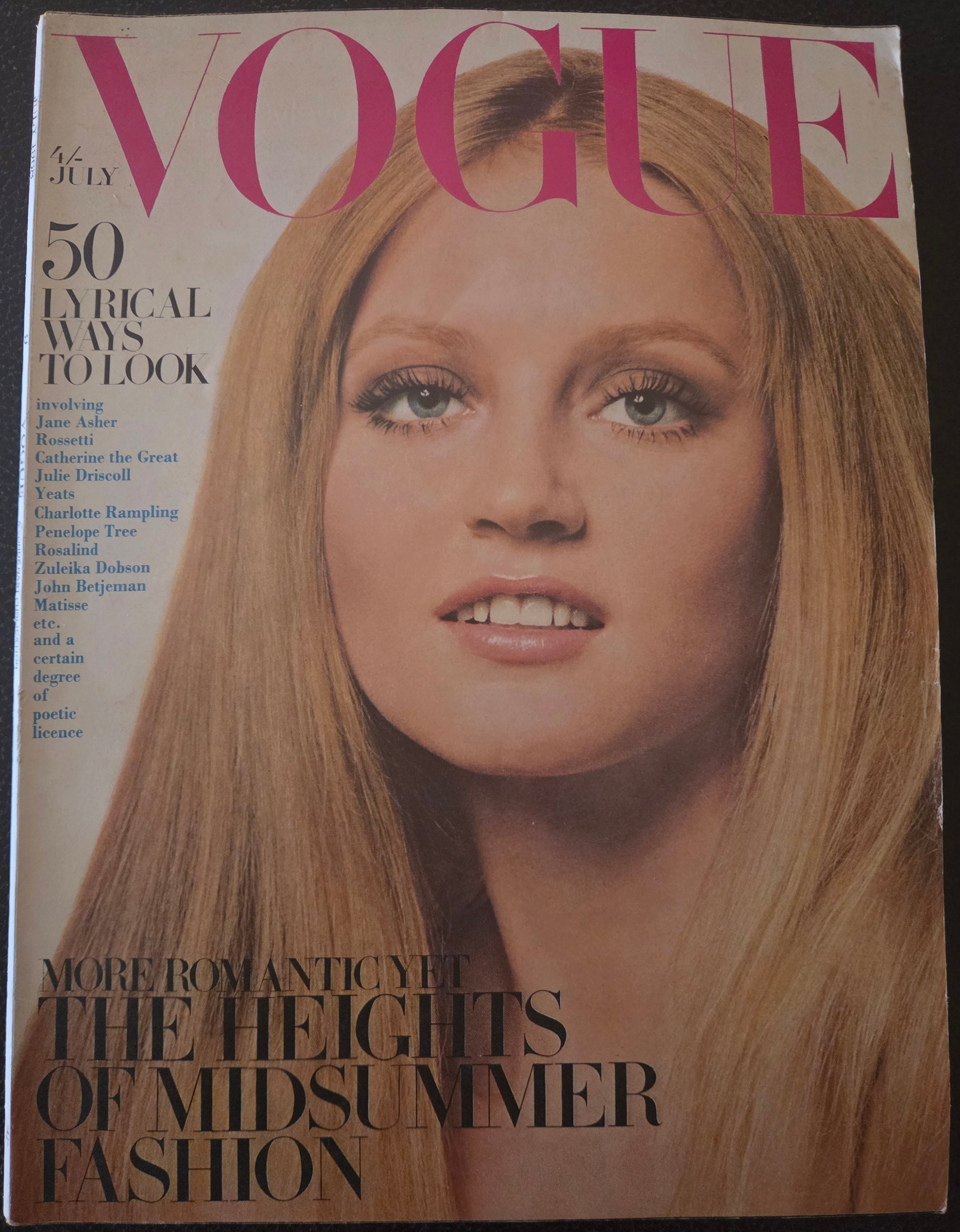 Vogue magazine cover with a model's face and text