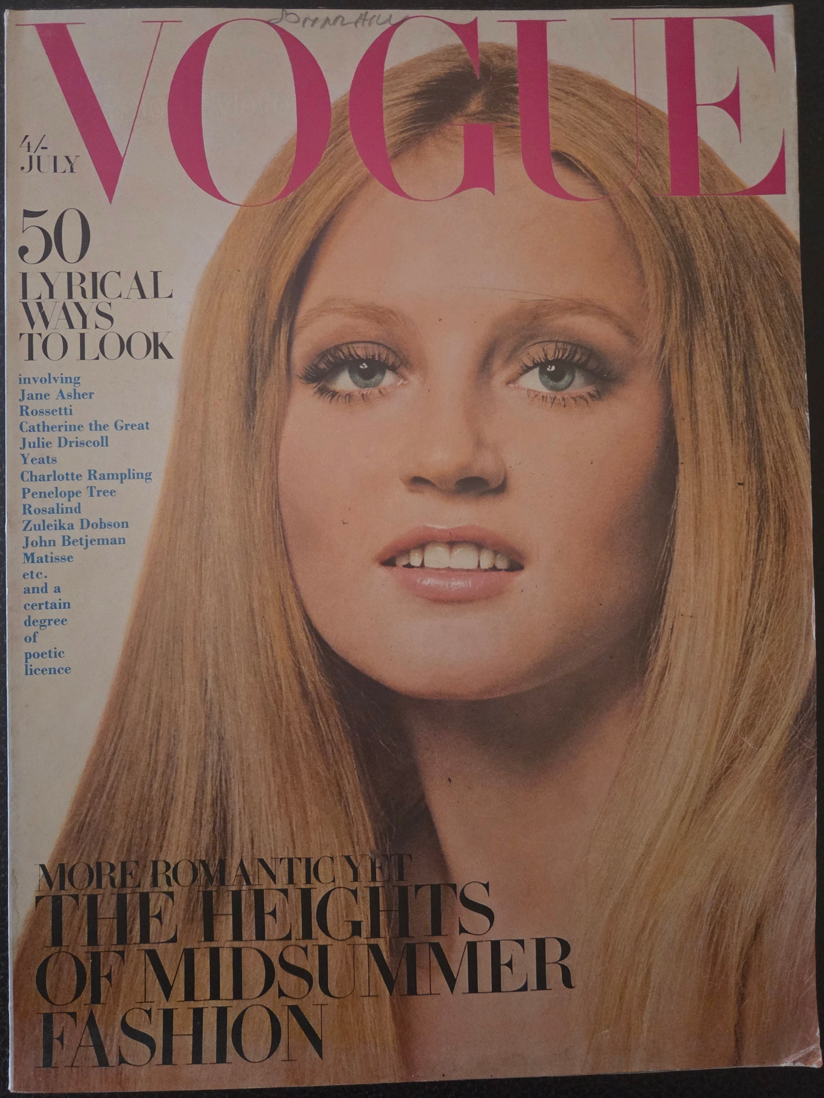 Vogue with model's face on cover.