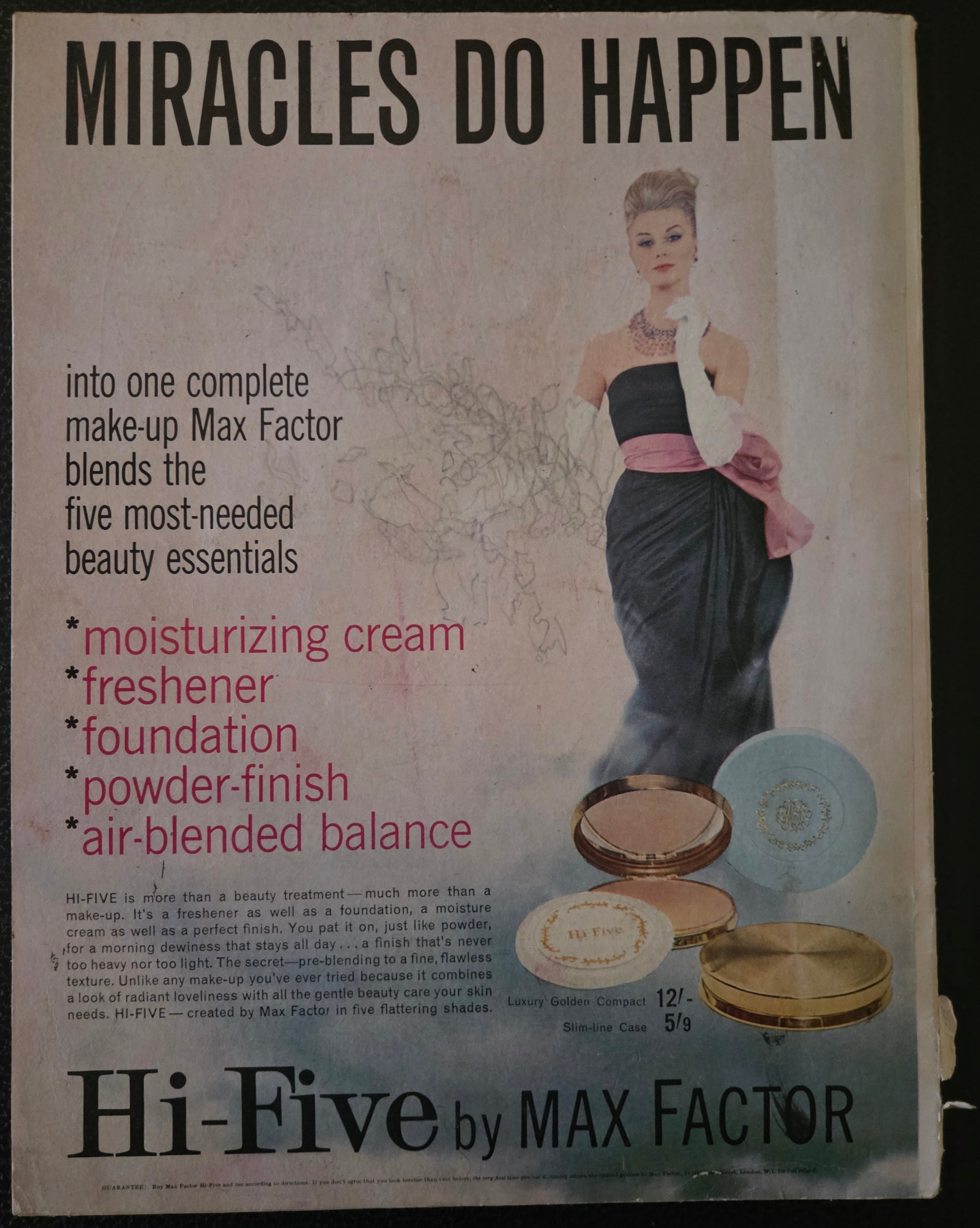 Max Factor advertisement with a woman and cosmetic products