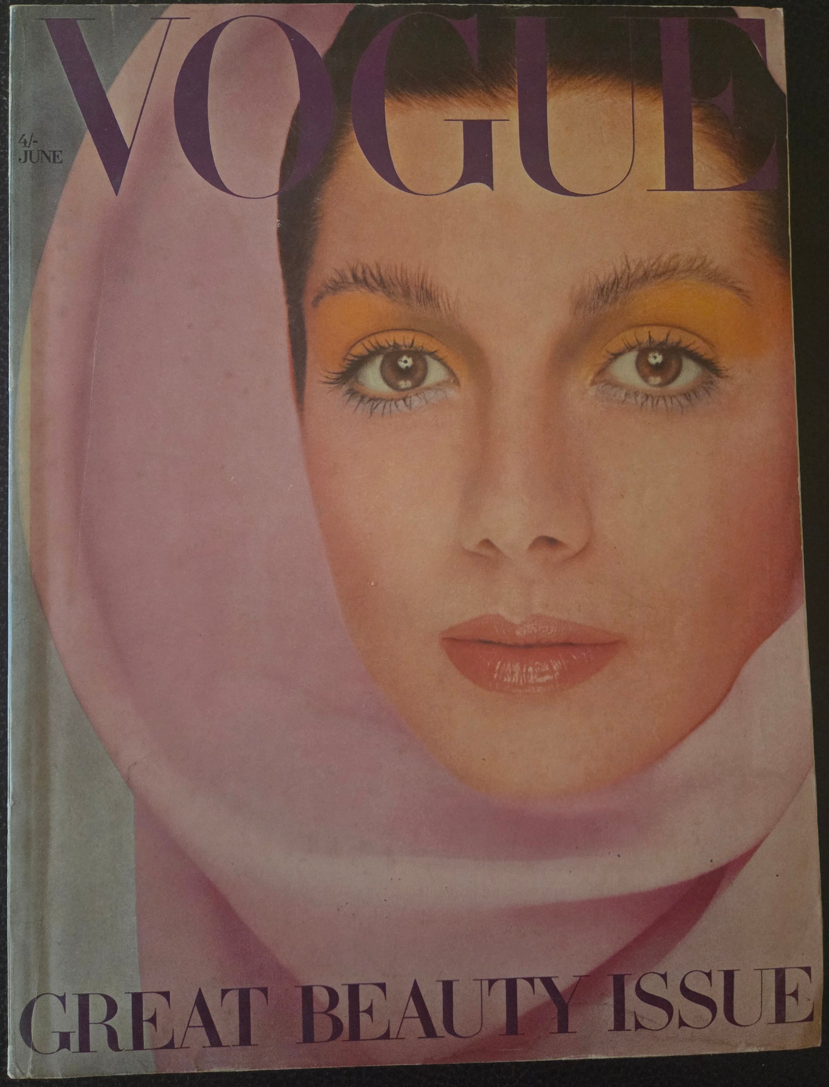 Vogue with model in pink headscarf.