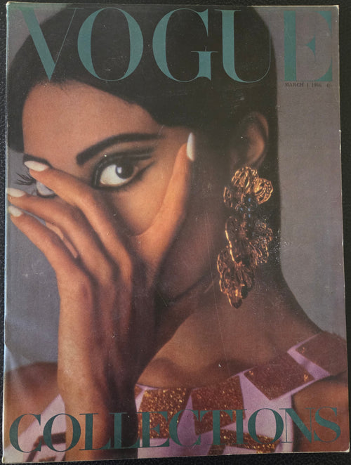 Vogue magazine cover with a model wearing a gold earring