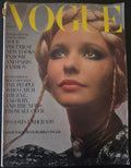 Vintage Vogue magazine cover with a woman's face and text