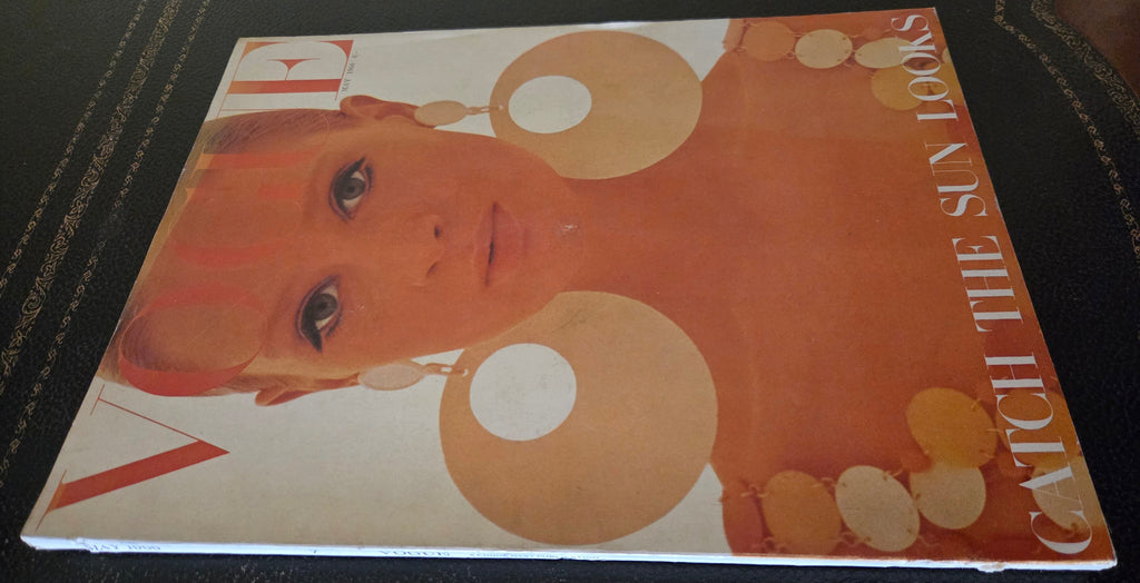 Vogue with model wearing large circular earrings