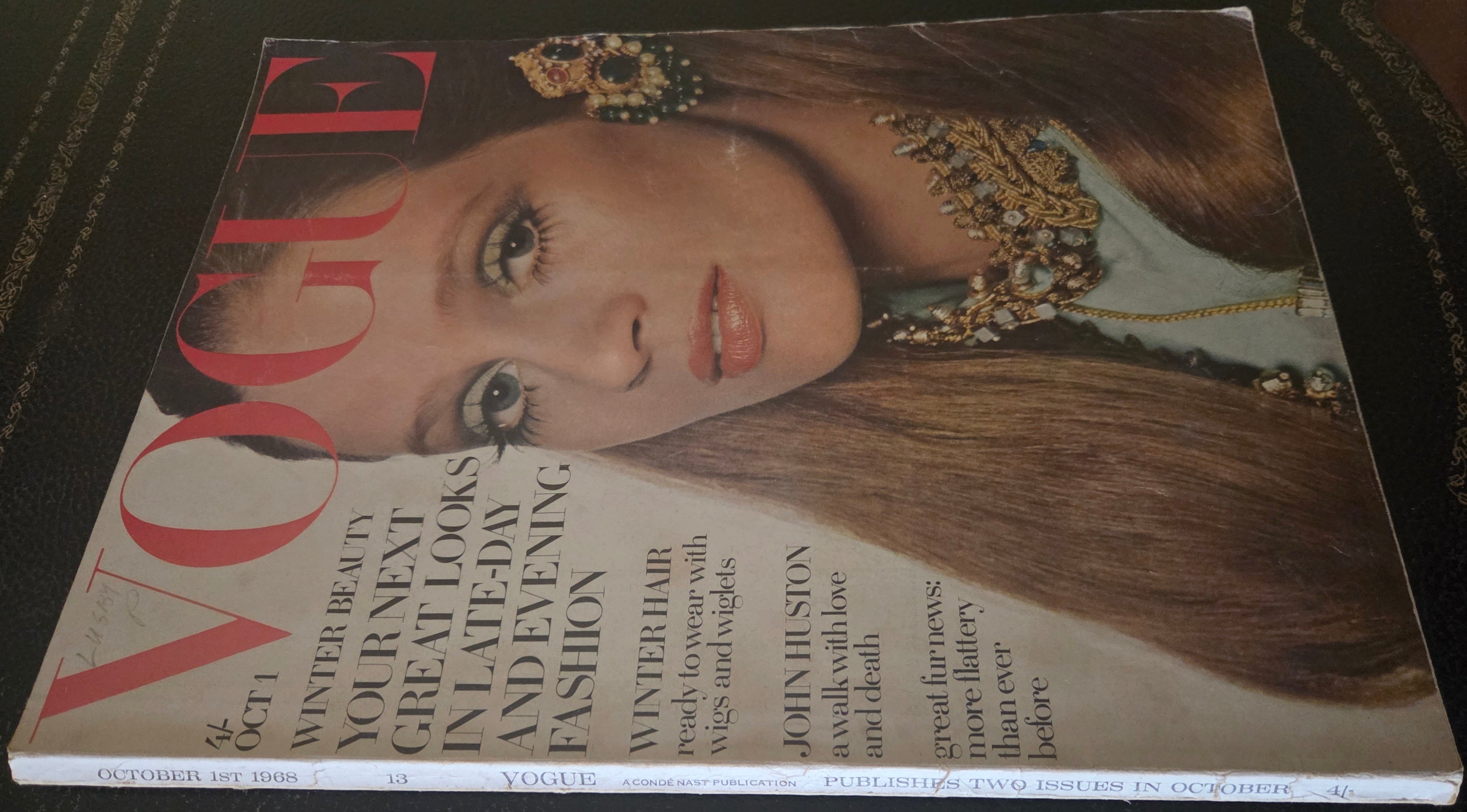 Vogue with model wearing gold jewellery.