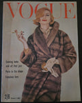 Vintage vogue featuring model in fur coat holding a cigarette