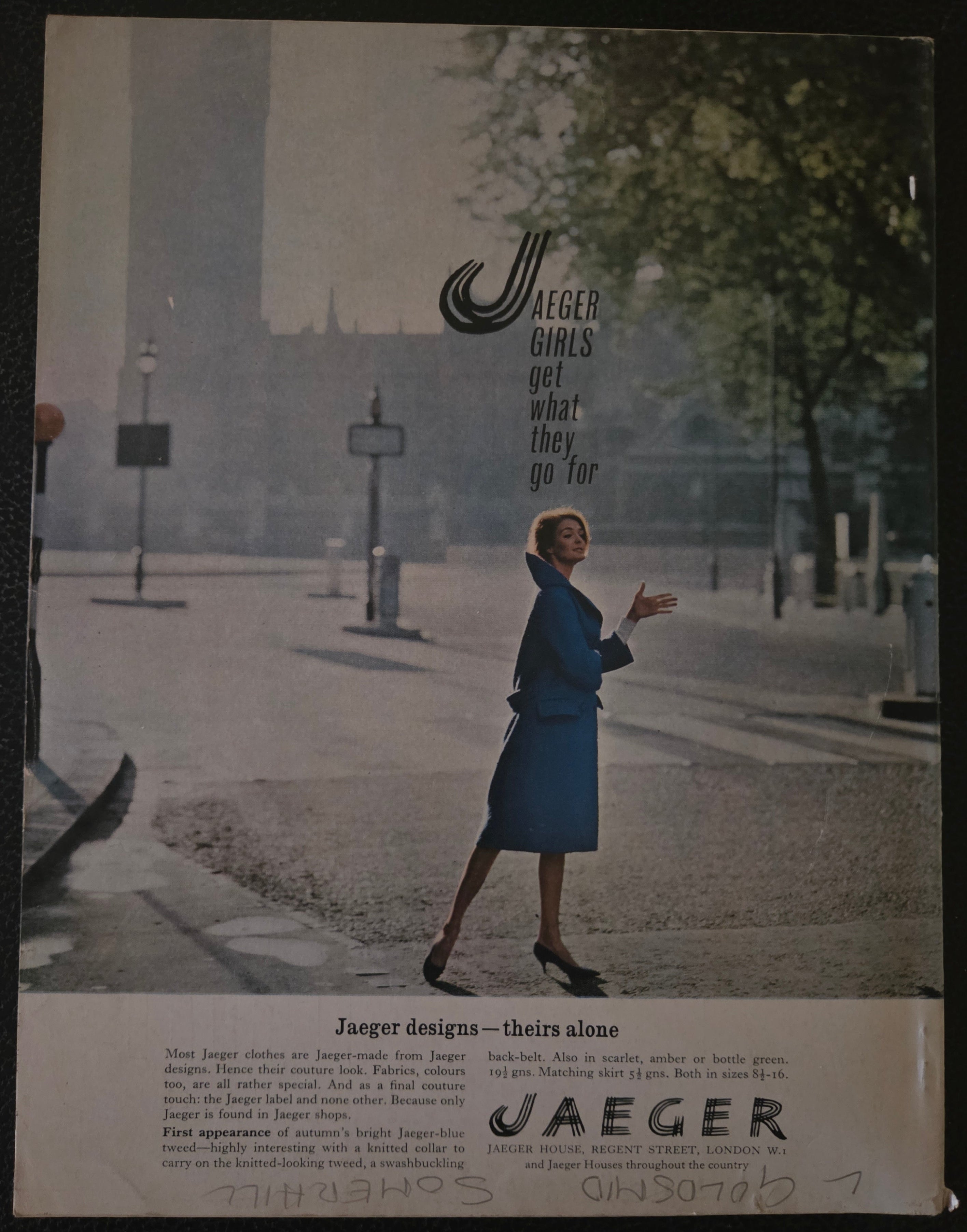 Vintage Jaeger advertisement with a woman in a blue dress on a street.