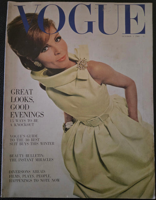 Vogue magazine cover with a model in a dress