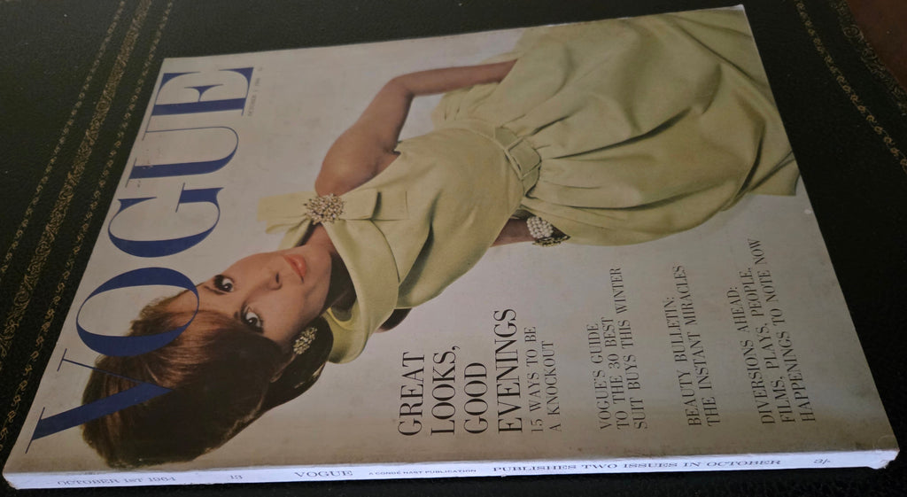 Vogue magazine cover with a woman in a dress 