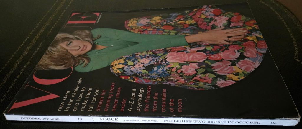 Vintage vogue with model in green skirt and floral skirt.