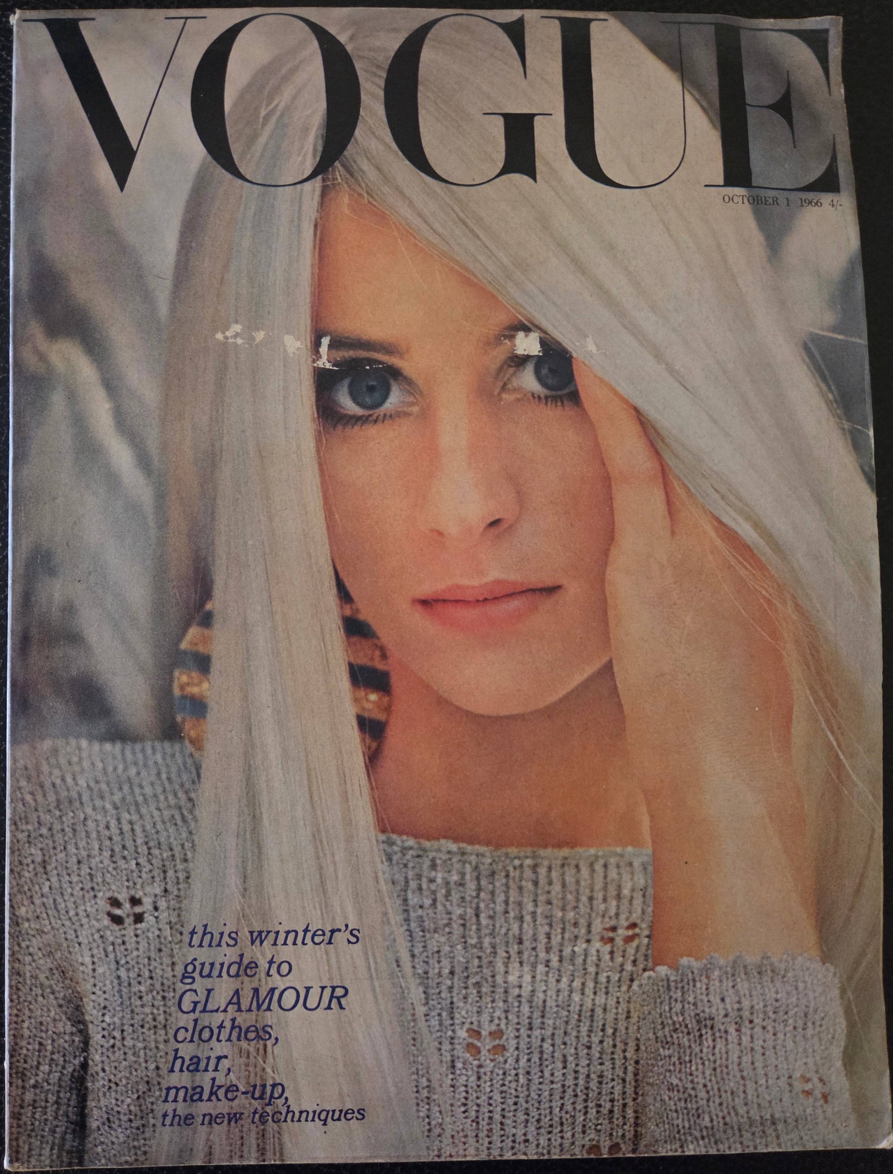Vogue with model that has silver hair.