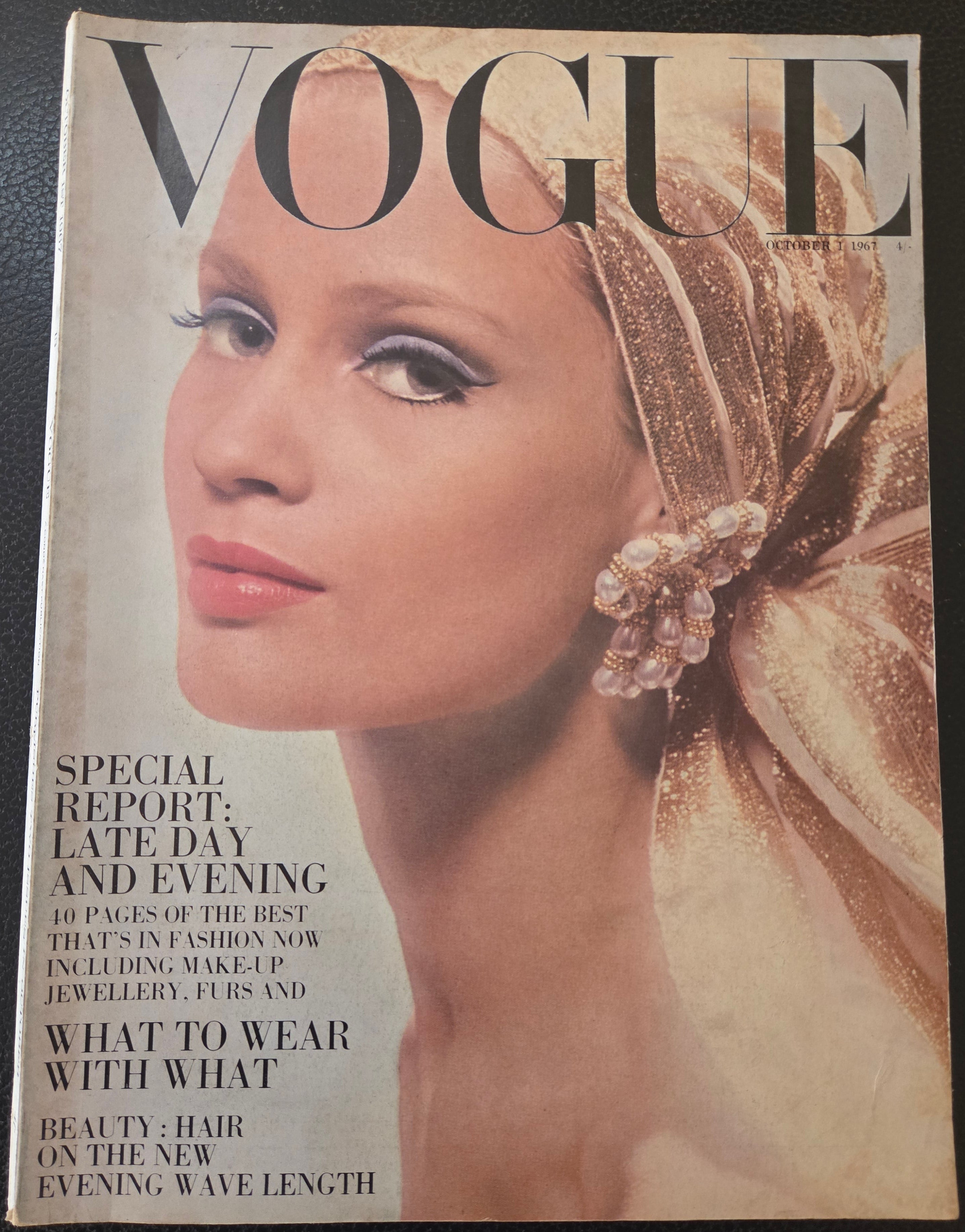 Vogue magazine cover with a woman's face and text