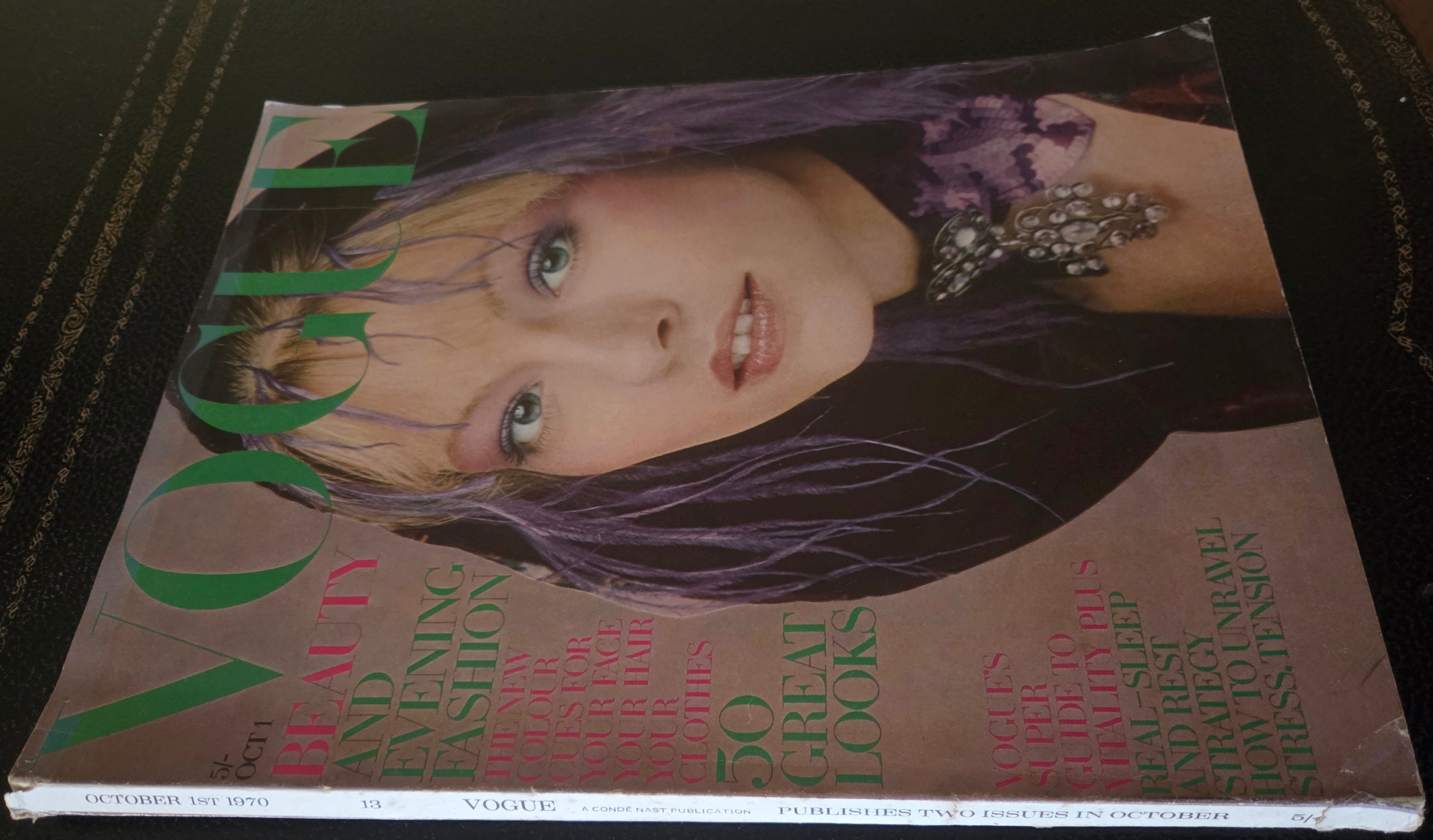 Vogue magazine with model in hood.