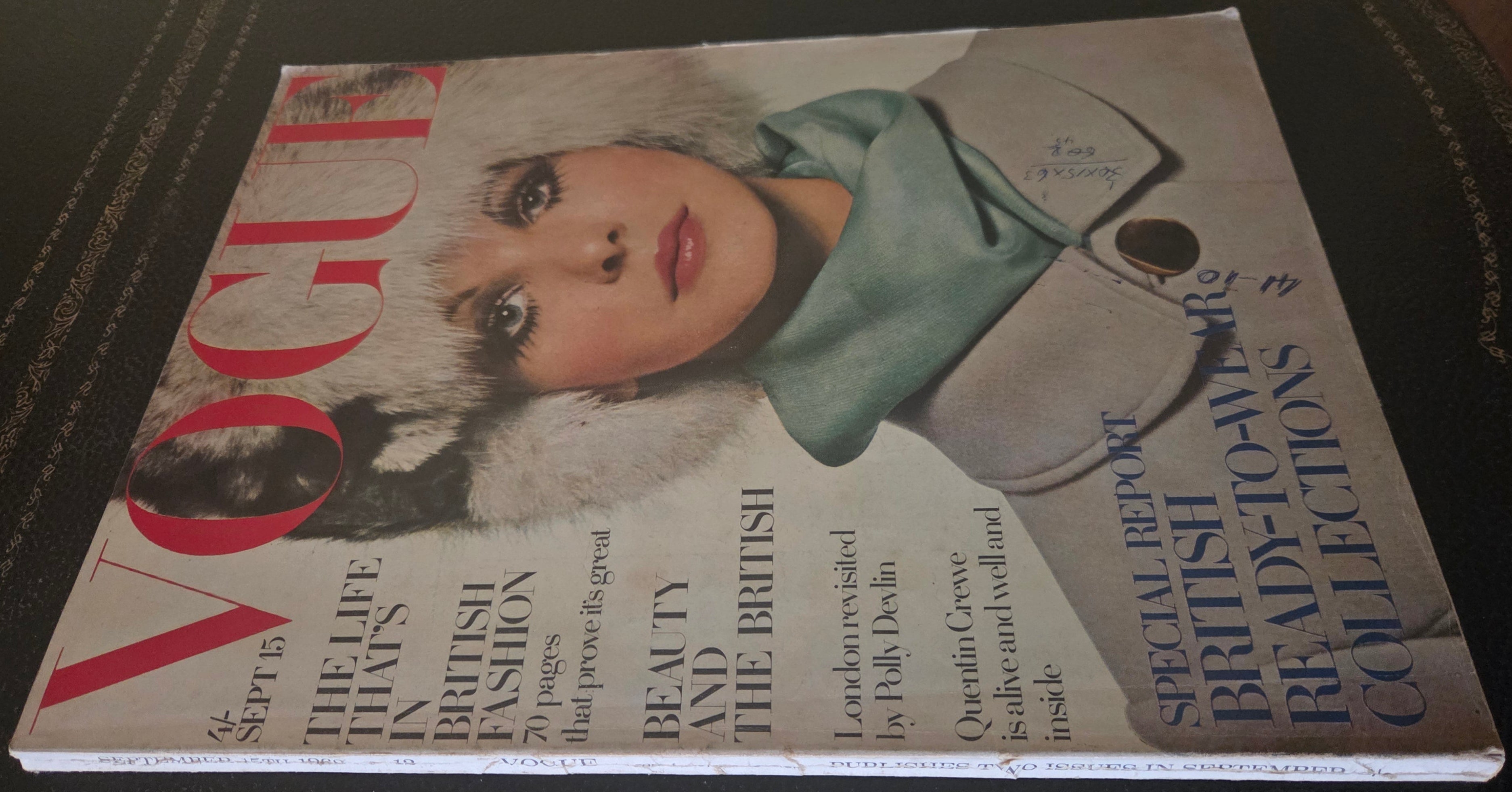 Vogue with model in fur hat.