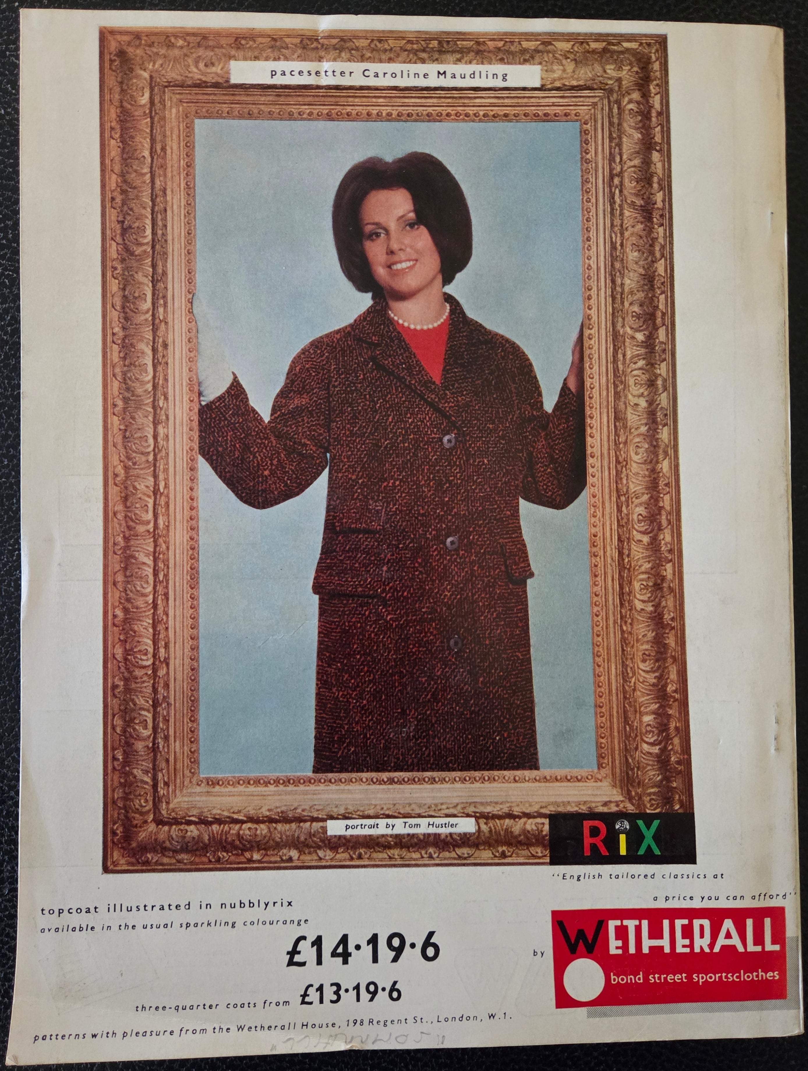 Vintage advert of a person in a coat with a decorative frame advertising Wetherall