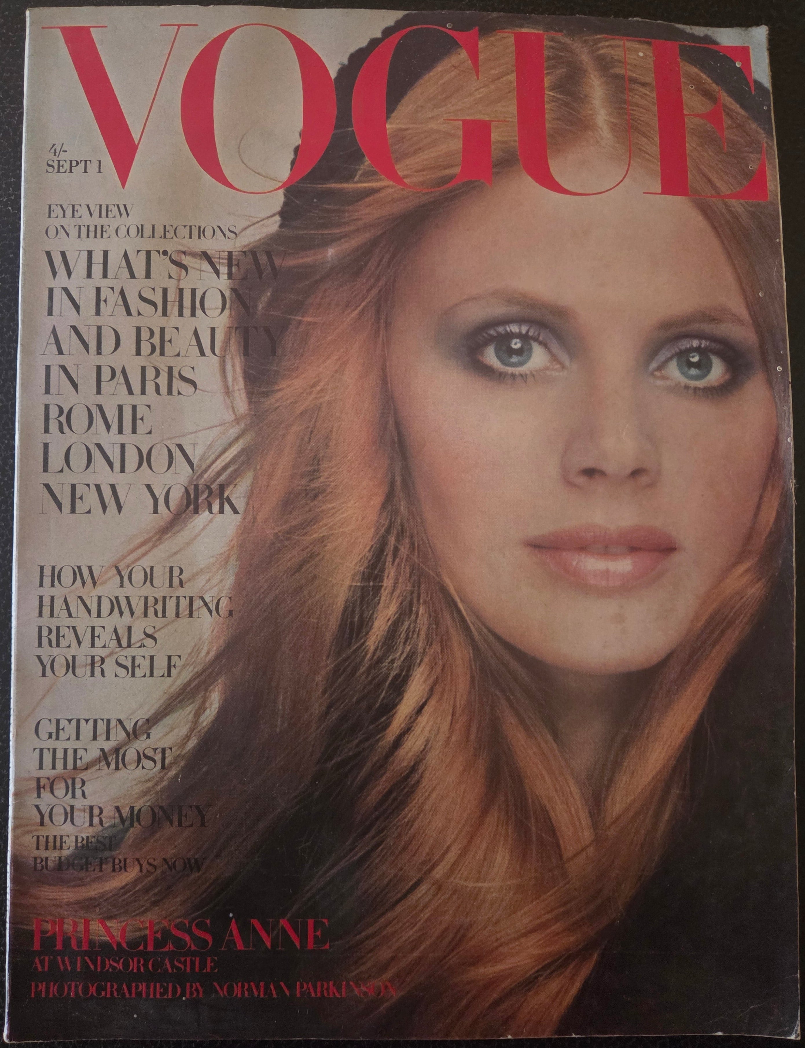 Vogue magazine cover with a woman's face and text